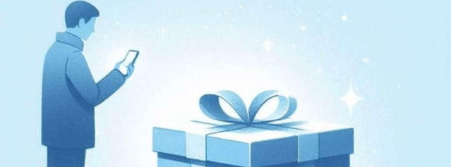 una persona guarda il telefono di fronte ad un grande pacco di natale